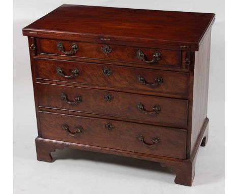 A mahogany bachelors chest, George III and later adapted, the rectangular fold-over top above four long graduated drawers, ea