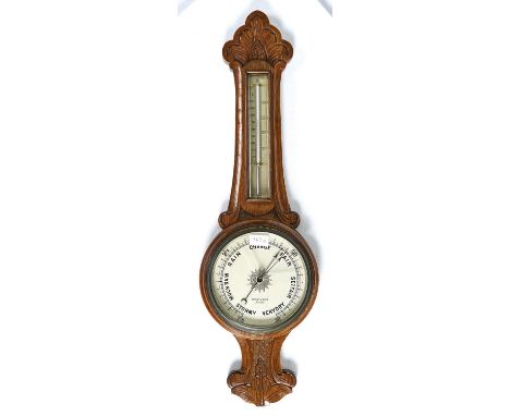 A CARVED OAK ANEROID BAROMETER, C1910, DYSON &amp; SONS, LEEDS, WITH MERCURY THERMOMETER, 84CM&nbsp; H Condition reportOne of