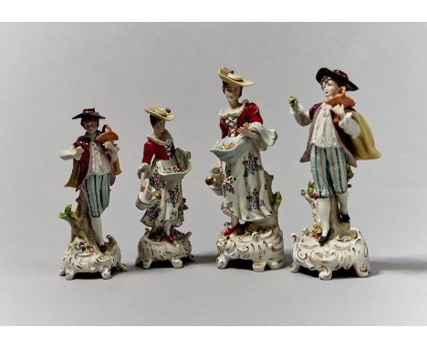 TWO PAIRS OF SITZENDORF FIGURES OF GARDENERS, POST 1945, IN 18TH C DRESS, ENAMELLED AND GILT, 20 AND 23CM H, CROWN AND S Cond