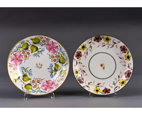 TWO NEW HALL SAUCER DISHES, PATTERNS 1167 AND 1765, C1815-20, ENAMELLED WITH WIDE BORDERS OF STYLISED FLOWERS IN PREDOMINANTL