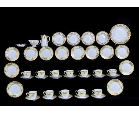 A NORITAKE TEA SERVICE, SECOND HALF 20TH C, WITH CREAM AND GILT BORDER, THE SERVICE INCLUDING A TWO HANDED BOWL 24CM DIAM, PR
