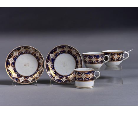 A NEW HALL TRIO AND CUP AND SAUCER, PATTERN 882, C1810-12, WITH COBALT AND GILT BORDER PATTERN, SAUCER 14CM DIAM Condition re