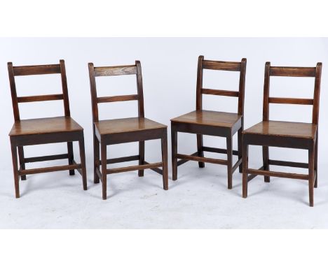 A SET OF FOUR ELM KITCHEN CHAIRS, C1850, SIMPLE BAR BACKS WITH BOARDED SEATS ON SQUARE TAPERED LEGS JOINED BY STRETCHERS, 82C