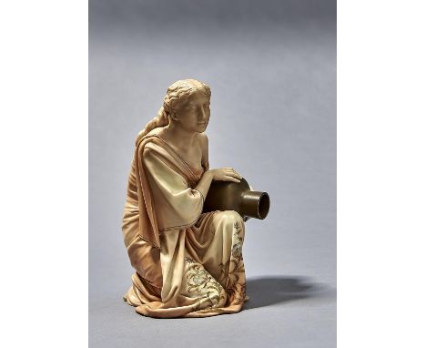 A ROYAL WORCESTER FIGURE OF A KNEELING WATER CARRIER, DESIGNED BY JAMES HADLEY, 1889, THE SHADED APRICOT GARMENT DECORATED WI
