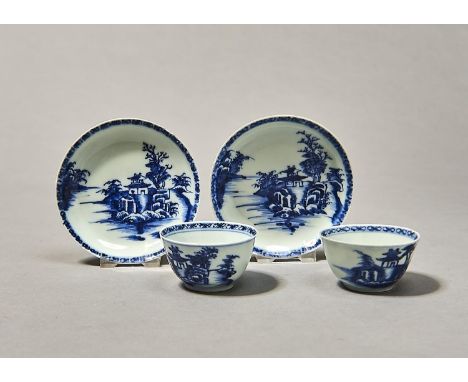 TWO CHINESE NANKING CARGO PAGODA RIVERSCAPE PATTERN TEA BOWLS AND SAUCERS OF THE SMALL SIZE, C1750, PAINTED WITH A TWO STORIE