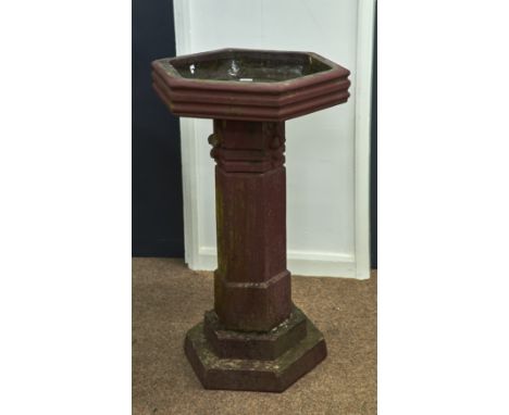 A HEXAGONAL VICTORIAN TERRACOTTA BIRD BATH AND PEDESTAL, C1900, THE HEXAGONAL BOWL GLAZED ON THE INTERIOR ON DETCHABLE PILLAR