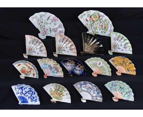 FIFTEEN CHINESE DECORATIVE PORCELAIN FAN SHAPED DISHES, LATE 20TH C, DECORATED WITH BIRDS ON BRANCHES, INSECTS, PEACH AND FLO