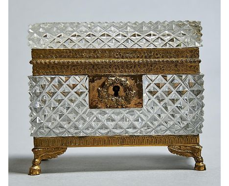 A FRENCH GILT BRASS MOUNTED CUT GLASS TEA CADDY, PROBABLY BACCARAT, C1880, WITH STAMPED MOUNTS AND WREATHED LOCKPLATE ON WING