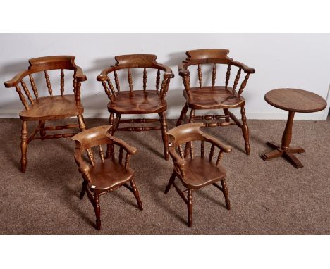 AN OAK OCCASIONAL TABLE, C MID 20TH C, THE ROUND TOP ON BALUSTER PILLAR AND CRUCIFORM FOOT, 51CM H, 44CM DIAM, THREE ASH SMOK