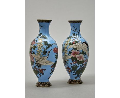 A PAIR OF JAPANESE CLOISONNÉ ENAMEL VASES, MEIJI PERIOD, DECORATED WITH CRANES AND FLOWERS ON A SKY BLUE GROUND, 31.5CM H Con