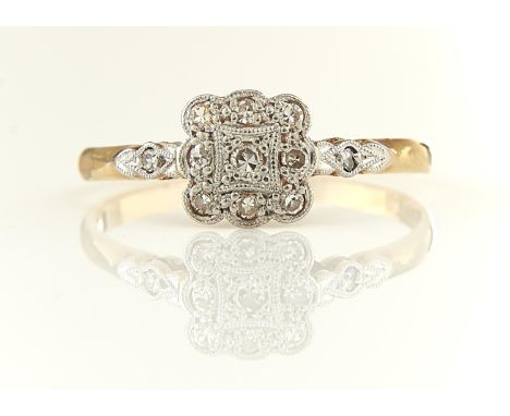 A DIAMOND CLUSTER RING, WITH DIAMOND SHOUDERS MILLEGRAIN SET, MARKS RUBBED, ...PLAT, 2G, SIZE Q½ Condition reportLight wear c