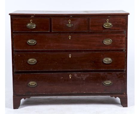 A REGENCY MAHOGANY CHEST OF DRAWERS, C1820, THE RECTANGULAR TOP WITH OVOLO MOULDING ABOVE THREE SHORT AND THREE LONG GRADUATE