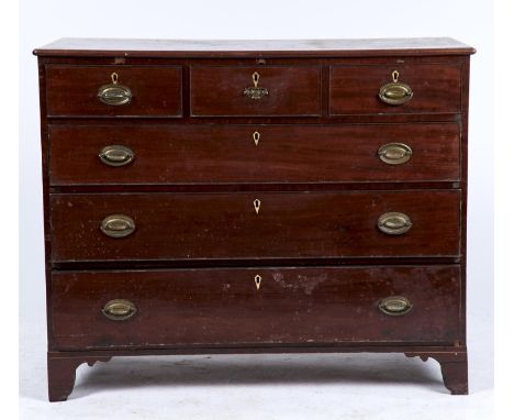 A REGENCY MAHOGANY CHEST OF DRAWERS, C1820, THE RECTANGULAR TOP WITH OVOLO MOULDING ABOVE THREE SHORT AND THREE LONG GRADUATE