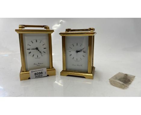 TWO ENGLISH MADE BRASS CARRIAGE CLOCKS WITH WHITE ENAMEL DIALS
