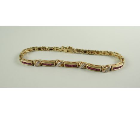 A 9CT GOLD RUBY & DIAMOND SET BRACELET, 10.3grams approx. (in box)