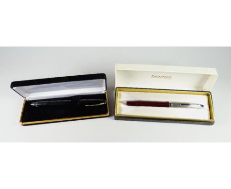 A VINTAGE BURGUNDY SHEAFFER IMPERIAL II TOUCHDOWN FOUNTAIN PEN with frosted stainless steel cap with a 1/8" polished area, fi