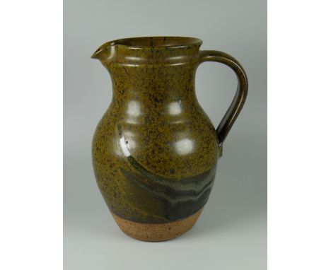 DAVID LLOYD JONES STUDIO POTTERY JUG with loop handle and mottled glaze, potter's mark, 22cms high