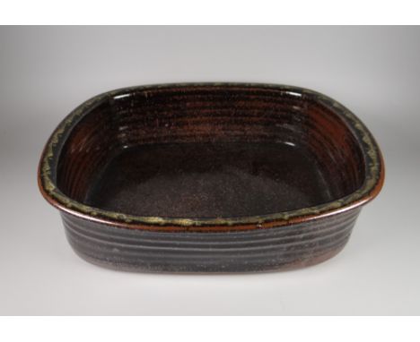 DAVID LLOYD JONES STUDIO POTTERY BASIN of rounded rectangular form with ribbed exterior, potter's mark, 33cms long