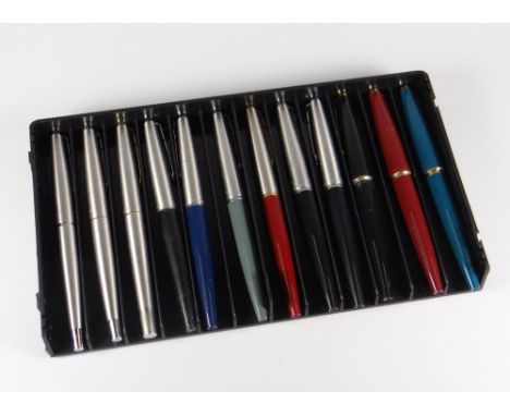 TRAY OF TWELVE PARKER 45 FOUNTAIN PENS two early Flighters with silver tail caps, a later Flighter with gold trim, 1 black Cl
