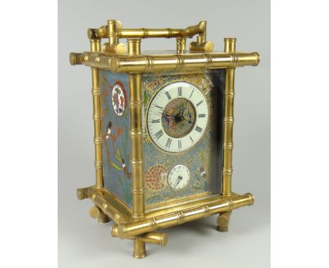 EARLY TWENTIETH CENTURY BRASS BAMBOO DESIGN CARRIAGE CLOCK the front & side panels decorated with birds & foliage in Oriental