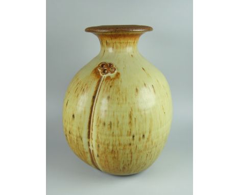 DAVID LLOYD JONES STUDIO POTTERY VASE of segmented naturalistic form and with disk neck, potter's mark, 24cms high