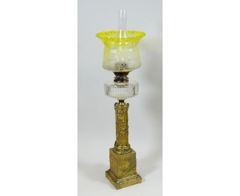 A UNUSUAL ANTIQUE OIL LAMP the base in the form of a deteriorating Roman-period two-section column ravaged by vegetation and 