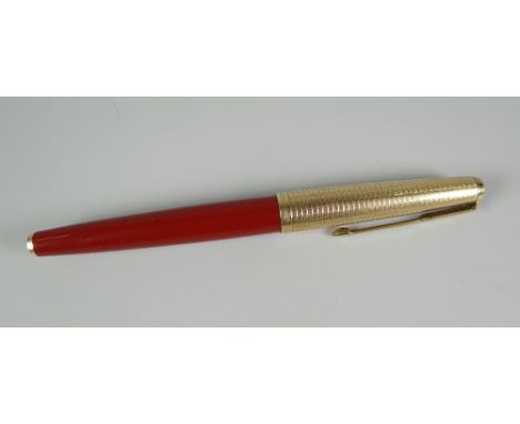 A VINTAGE RAGE RED PARKER 61 FOUNTAIN PEN with rolled gold grid patterned cap (arrow on nib unit missing)