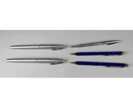 FIVE VARIOUS SHEAFFER PENS including a modern brushed chrome Sheaffer Triumph 444 fountain pen, fitted with a stainless steel