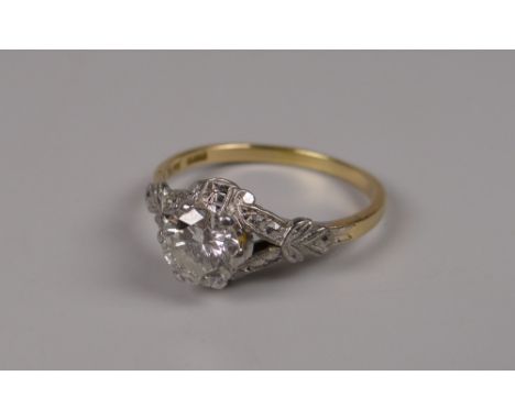 AN ANTIQUE PLATINUM & 18CT GOLD DIAMOND SOLITAIRE SPLIT FLORAL SHOULDER RING, diam 0.8ct visual estimate, 3.1grams, (size R)