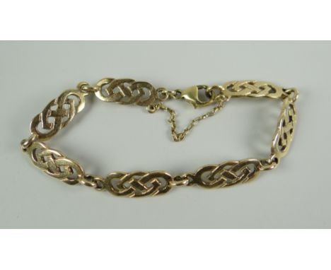 A 9CT GOLD LADIES CELTIC DESIGN BRACELET, 13.6grams approx.