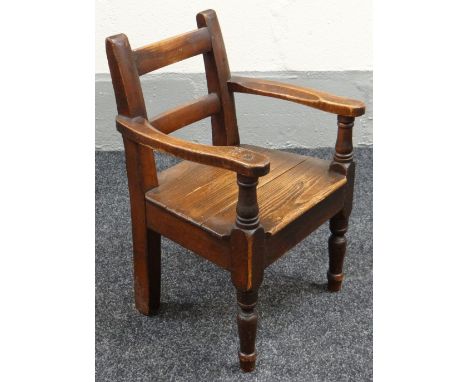VICTORIAN PAINTED PINE WELSH CHILD'S CHAIR WITH LADDER BACK raised on two turned front legs, 52cms high