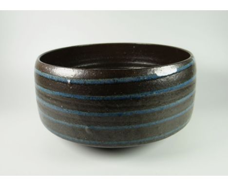 DAVID LLOYD JONES STUDIO POTTERY LARGE BOWL of simple form with blue ribbing, potter's mark, 26cms diam