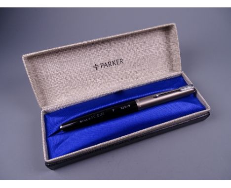 A VINTAGE BLACK PARKER 61 CLASSIC with satin Lustraloy cap & chrome plated trim, chalk marks on barrel, in original box