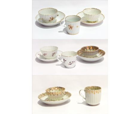 Early English porcelain trio of cup, saucer and tea bowl, decorated in iron red and gilt and stylised floral sprays to wrythe