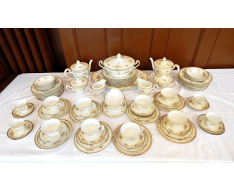 A Noritake porcelain dinner and tea service decorated in floral pattern 