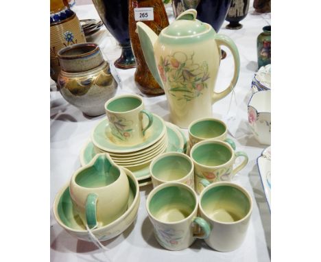 Early 20th century Susie Cooper pottery coffee set having green shaded borders and stylised floral spray decoration, includin