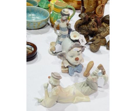 Three Lladro ceramic clown figures and heads 