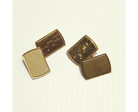 A pair of 9ct gold gentleman's cufflinks with engine-turned engraving and initials "JJR" 
