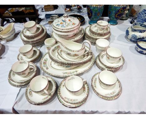 A Wedgwood china tea service with floral decoration together with a part dinner service "Kutani Crane" pattern with serving d