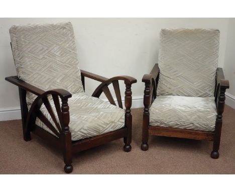 Pair Art Deco oak open armchairs, fan pierced arms, adjustable backs with upholstered loose back and seat cushions   Conditio