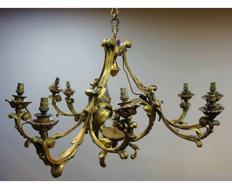 Gilt metal nine light three-branch Chandelier