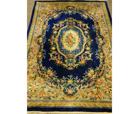 Large Chinese washed woollen blue ground rug carpet, 370cm x 278cm   Condition Report   Click here for further images, condit