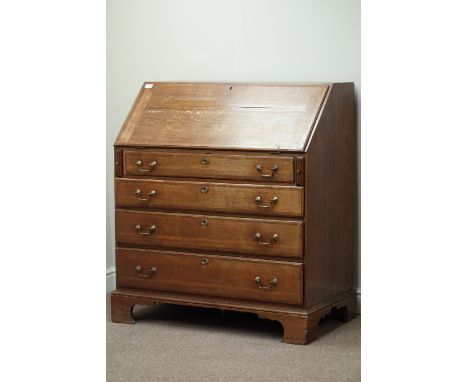 18th century oak bureau banded in walnut, fall front with well fitted interior, four graduating drawers, bracket feet, W100cm