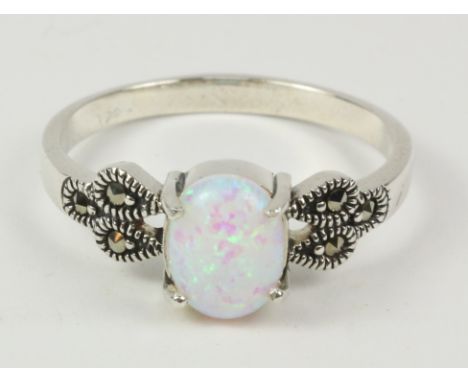 Opal ring with marcasite shoulders stamped 925   Condition Report   Click here for further images, condition, auction times &