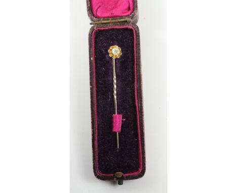 Diamond stick pin tested to 14/15ct   Condition Report   Click here for further images, condition, auction times & delivery c