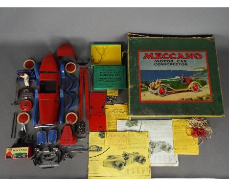 Meccano - A boxed Meccano No.2 Constructor Car with in red and blue with instruction leaflet and Hornby ephemera.  Parts appe