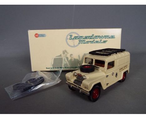 Lansdowne Models - A boxed Lansdowne Models LDM.40 1:43 scale Austin Gipsy LWB Hard Top. The model in cream with red wheels a