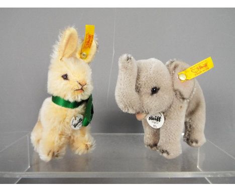 Steiff - a mohair Steiff rabbit #032479, approx 12 cm ( h ) with tag, yellow label and button and a mohair Steiff elephant #0