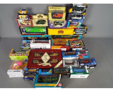 Cararama, Maisto, Corgi, Nintendo, Other - A collection of over 30 boxed diecast vehicles in a variety of scales, with a boxe