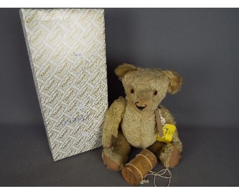 Chad Valley - An unmarked golden mohair teddy bear believed to be a 1920's Chad Valley 'Smiler' bear. Standing approximately 